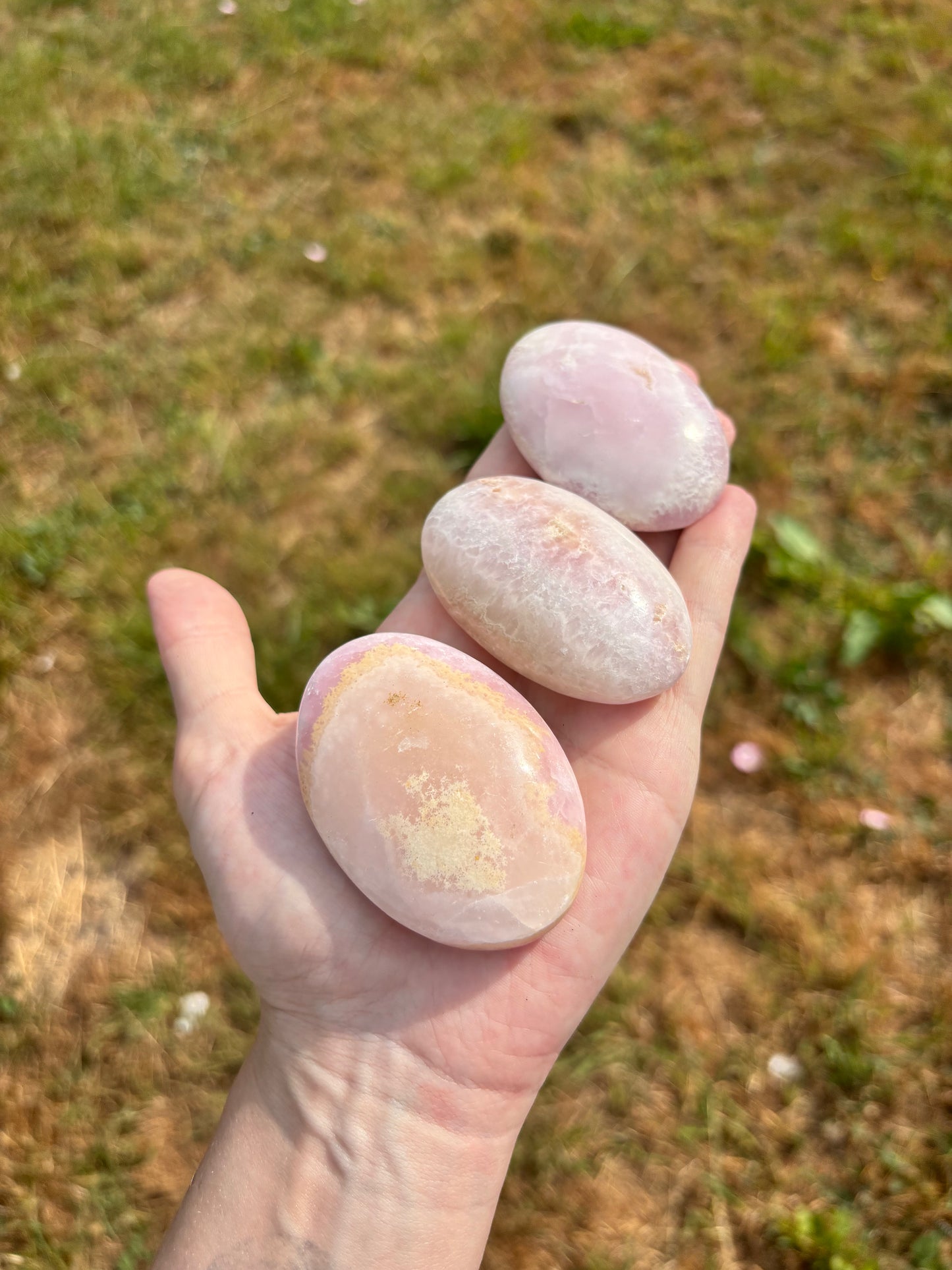 Pink aragonite Palm stone
