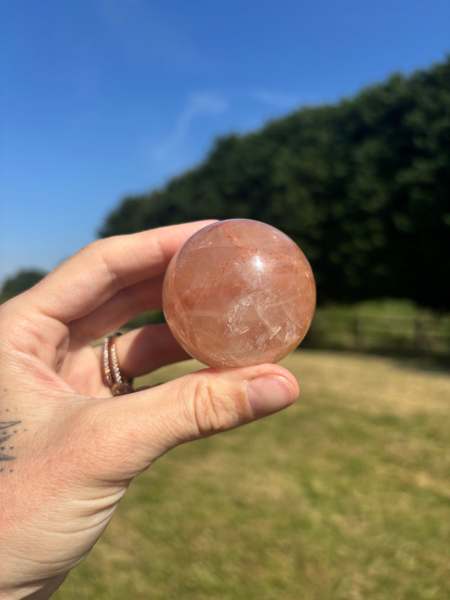 Rose quartz and fire quartz sphere