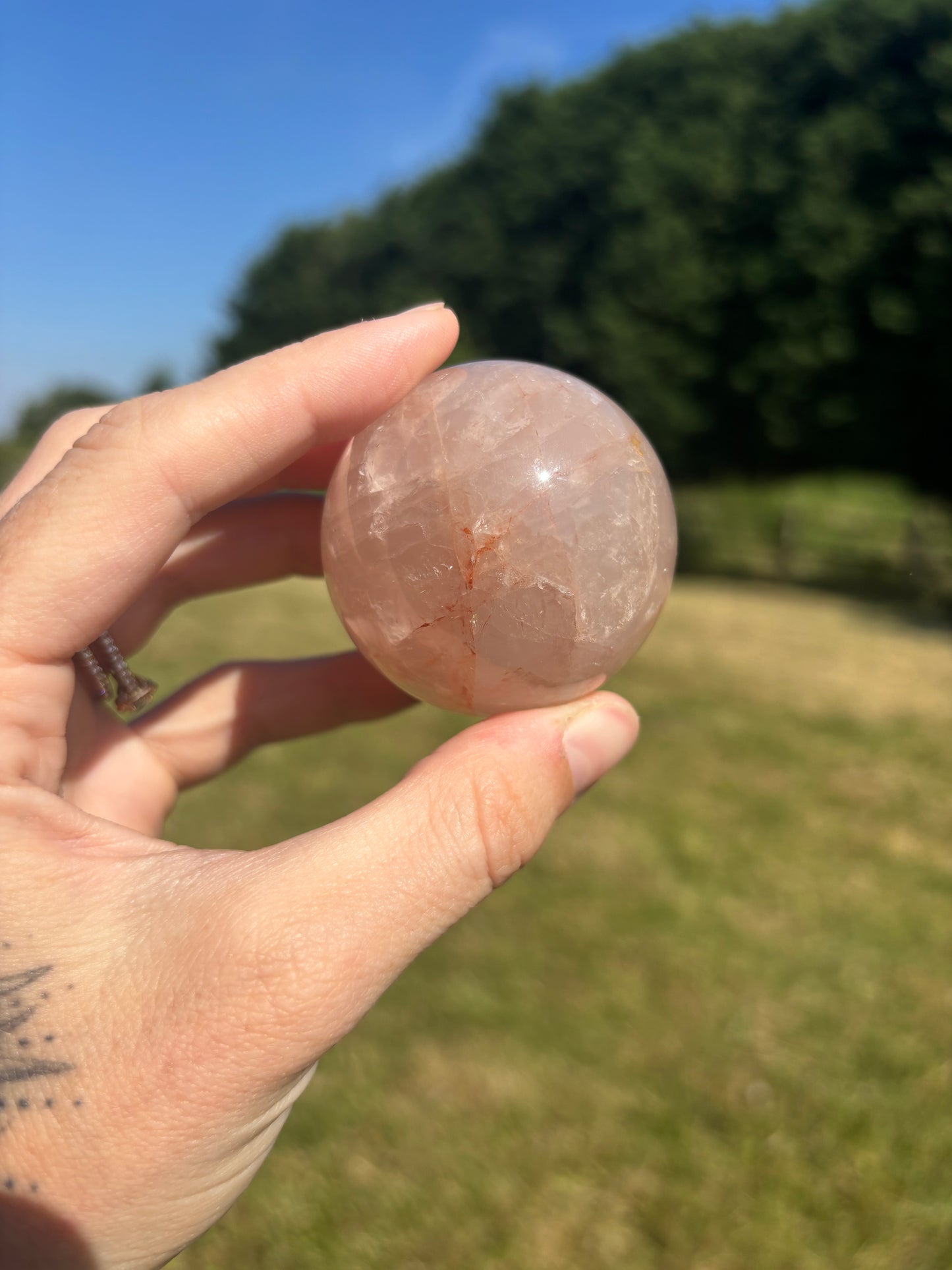 Rose quartz and fire quartz sphere