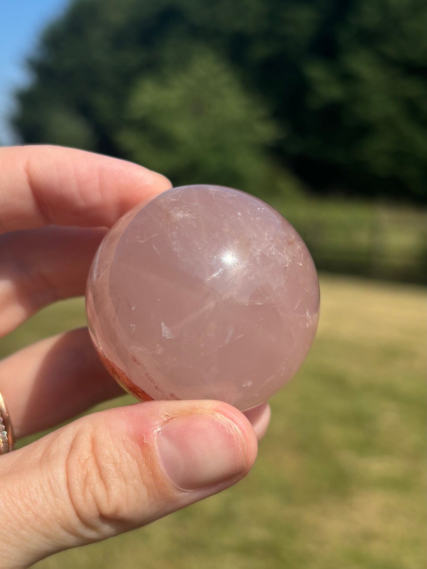 Starlight Rose quartz and fire quartz sphere