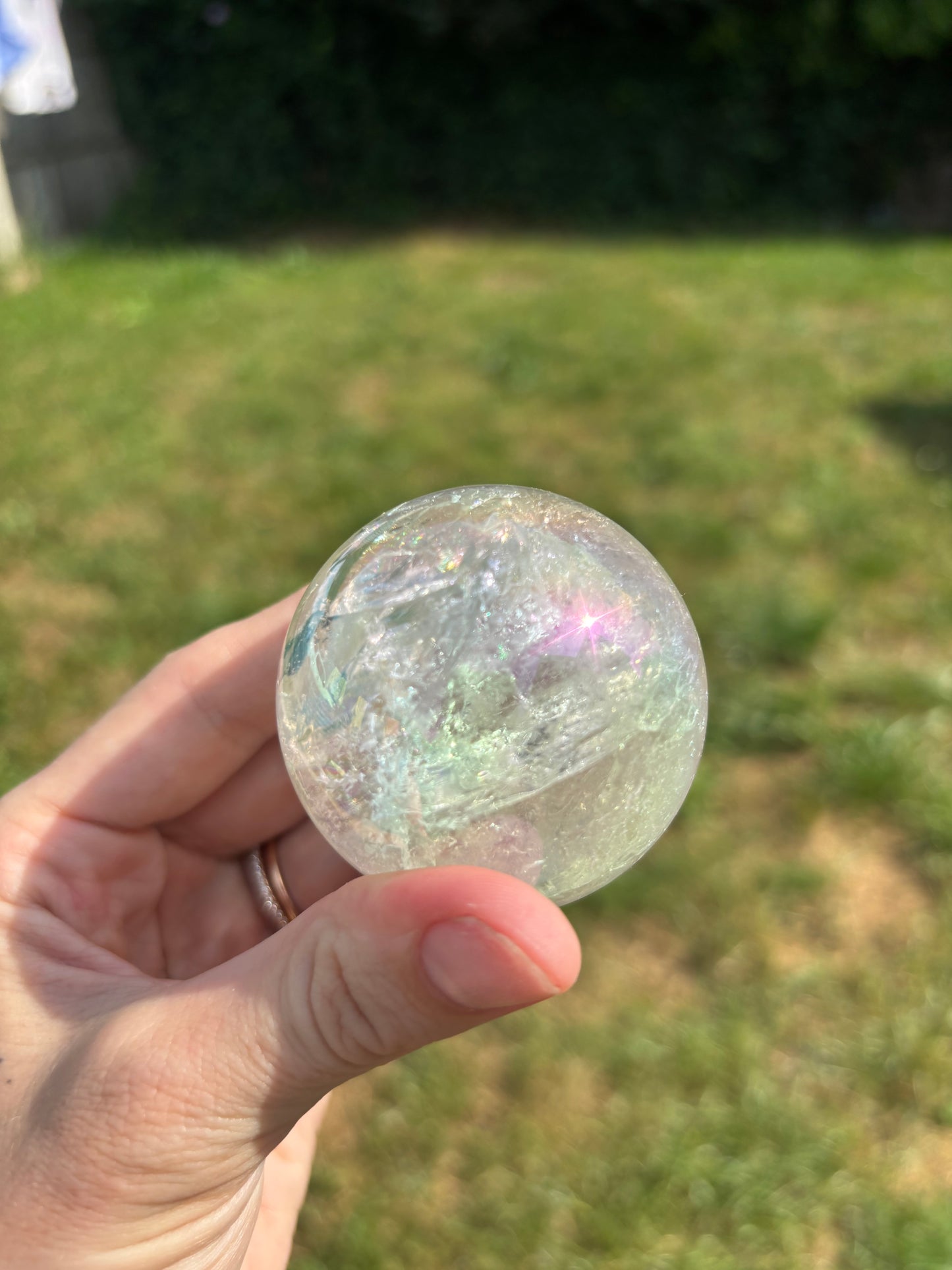 Aura clear quartz sphere