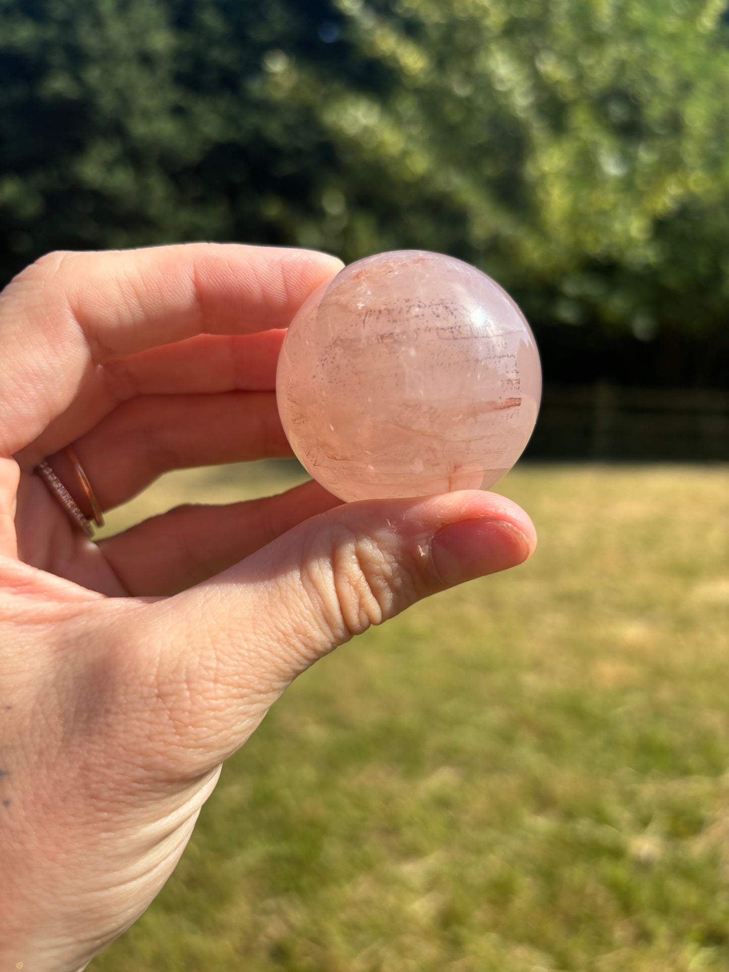 Starlight Rose quartz and fire quartz sphere