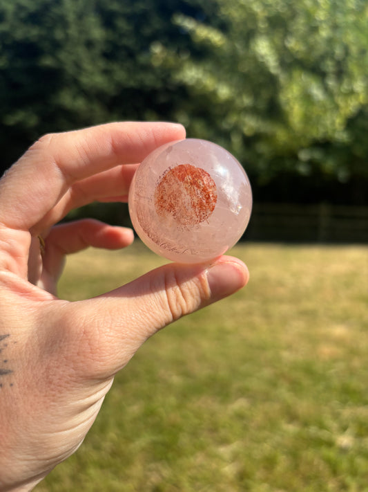 Starlight Rose quartz and fire quartz sphere