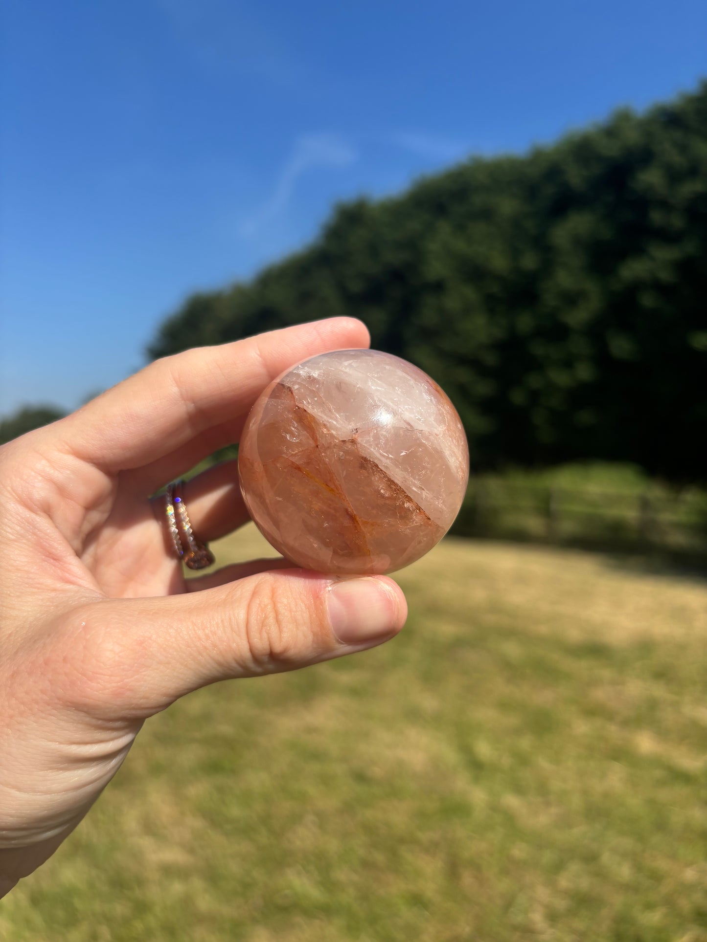 Rose quartz and fire quartz sphere