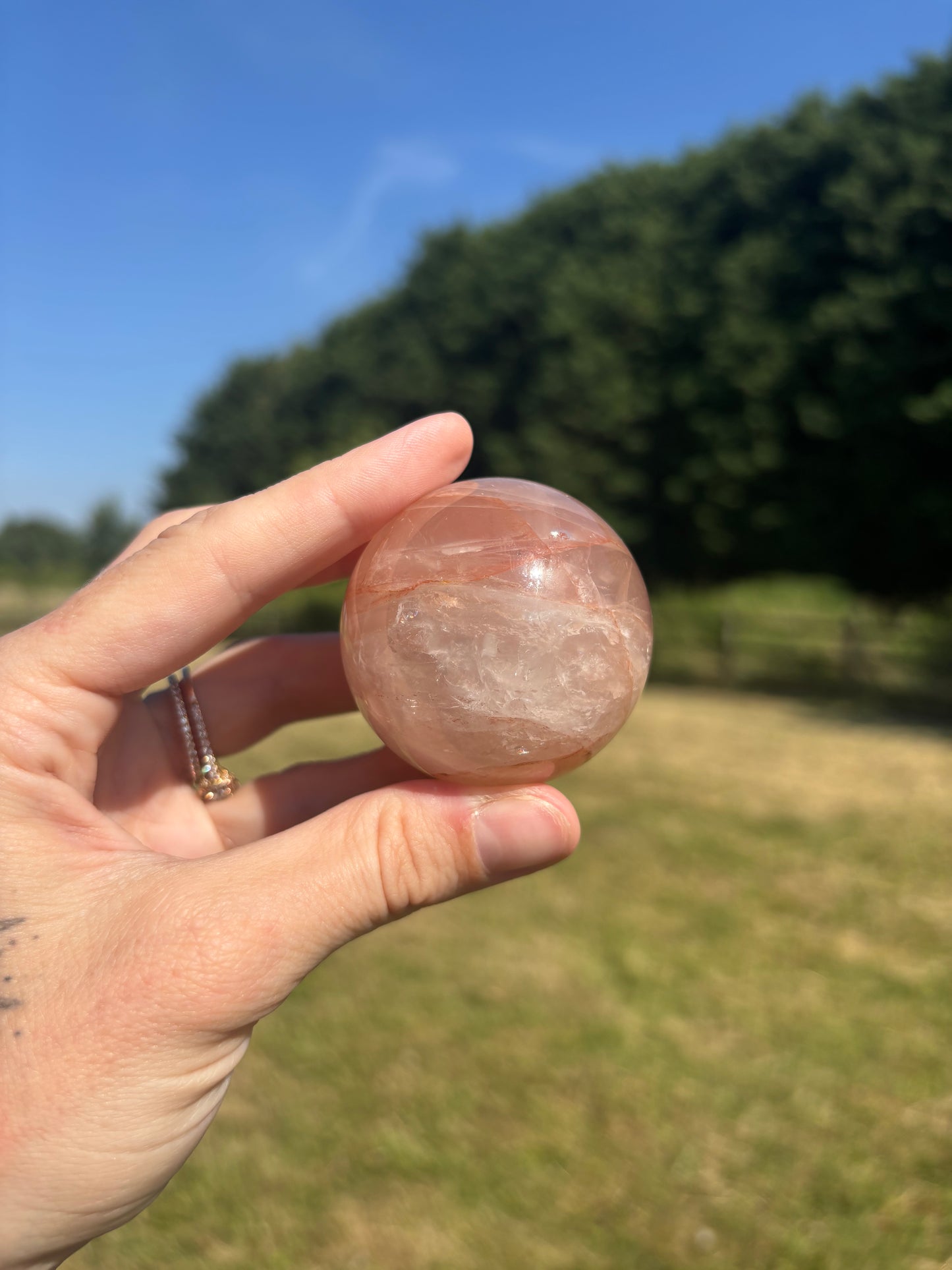 Rose quartz and fire quartz sphere