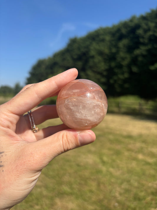 Rose quartz and fire quartz sphere