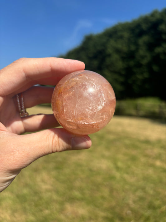 Rose quartz and fire quartz sphere