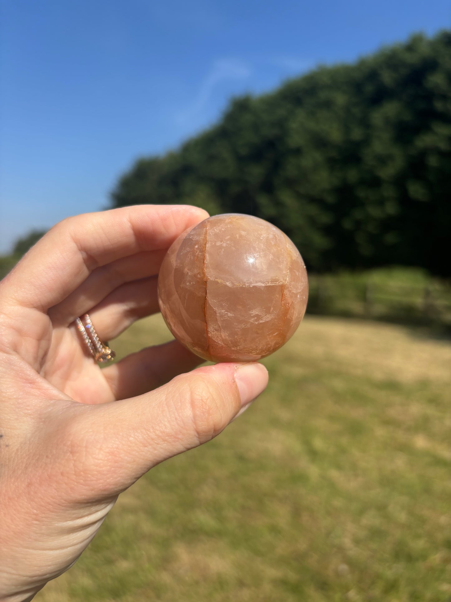 Rose quartz and fire quartz sphere